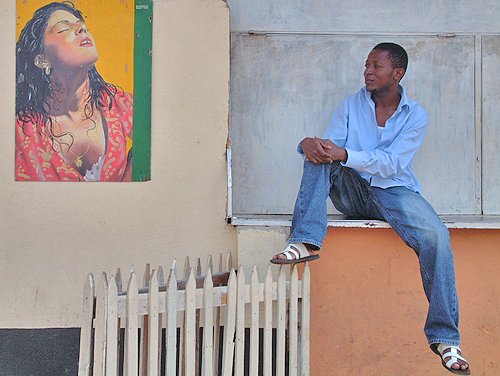 Young man with paintingon the wall. Bujumbura, Burundi # 4 © 2006 Jan Oberg, TFF