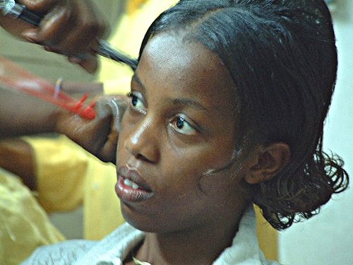 From beauty parlour in Bujumbura, Burundi © 2003 Jan Oberg