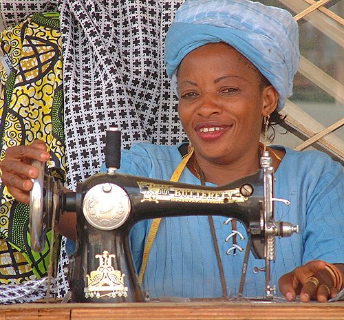 Woman sewing in the street. Bujumbura, Burundi # 3 © 2006 Jan Oberg, TFF
